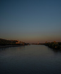 Obraz premium Bratislava capital in summer evening with color sunset and river Donau