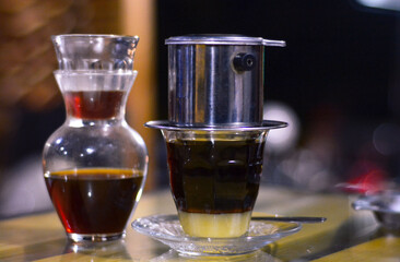 Close up Vietnamese drip milk and v60 coffee brewed manually