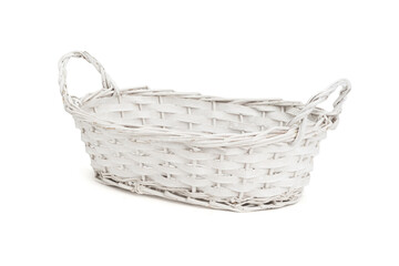 White wicker basket isolated on white background