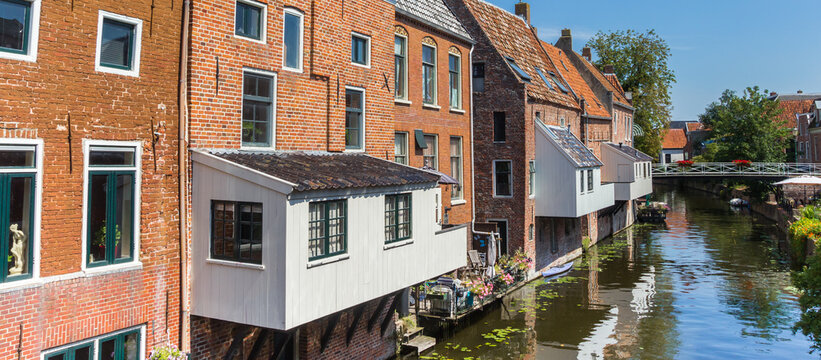 Panorama of hanging kitchens on historic houses in Appingedam, Netherlands