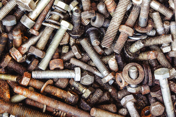Workshop parts background. Rusty bolts and screws texture. Metal industry collection. Grunge dirty set of mechanical elements.