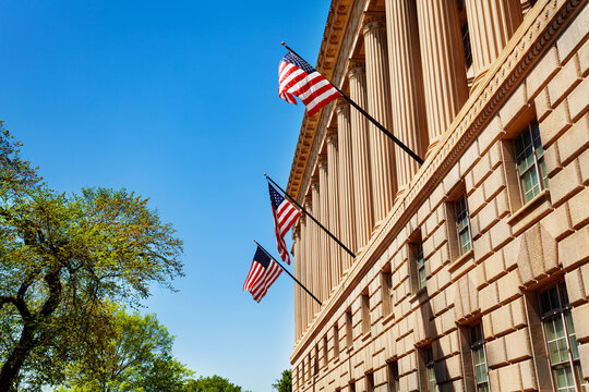 USA flags on National Oceanic and Atmospheric Administration in Washington, DC