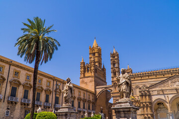 Fototapeta na wymiar Palermo Cathedral in Palermo, Sicily, Italy with statues and palm tree