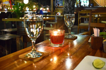 festive table setting with candles for Valentines party in the dark