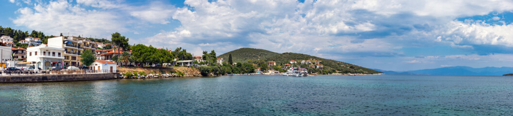 Fototapeta na wymiar Panoramic view of a small beach and port Mitzela, Amaliapoli, Greece.