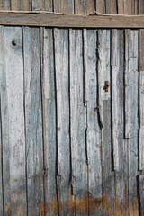 Old Weathered Door. Isolated. Rustic textured barn wooden  door. Stock Image.