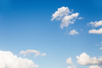 Naklejka na ściany i meble Clear blue sky and beautiful small white clouds