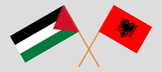 Crossed flags of Palestine and Albania