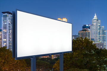 Blank white road billboard with Bangkok cityscape background at night time. Street advertising poster, mock up, 3D rendering. Side view. The concept of marketing communication to sell idea.