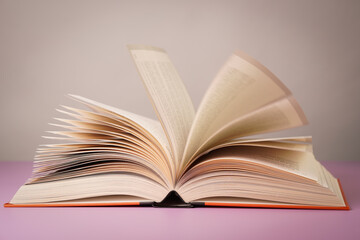 Close-up of open book on the table.