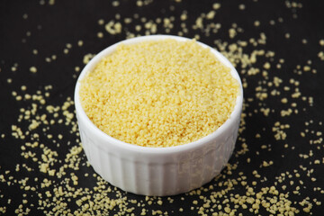 A ceramic bowl with couscous