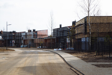 Fototapeta na wymiar building houses on a dirty construction site