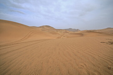 Fototapeta na wymiar Moving and stationary sand dunes-Badain Jaran Desert. Alxa Plateau-Inner Mongolia-China-1027