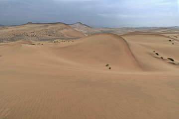 Fototapeta na wymiar Moving and stationary sand dunes-Badain Jaran Desert. Alxa Plateau-Inner Mongolia-China-1031