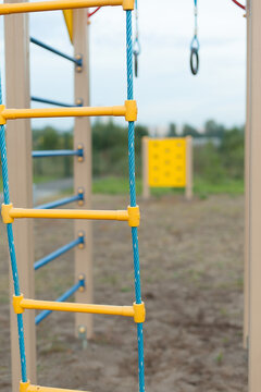 Outdoor Playground for children close-up. Rope ladder.