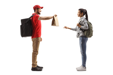 Full length profile shot of a guy delivering a food to a female student