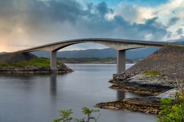 Fototapeta na wymiar Storseisundet Bridgealong the Atlantic Road that runs through an archipelago in More og Romsdal county, Norway. Built on several small islands and skerries, connected by causeways and bridges.