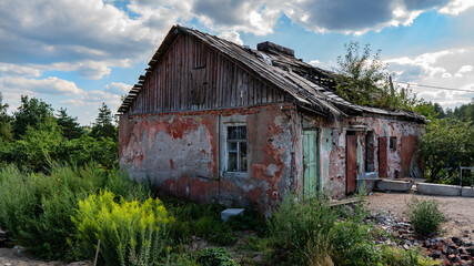 Old building with a collapsed roof in the village of Losevo