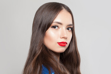 Fototapeta premium Portrait of brunette model woman on white background