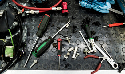 Tools in auto repair service. Service station close up