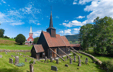 Fototapeta na wymiar The stunning Rodven Stave Church (stavkyrkje), More og Romsdal county, Norway. The brown, wooden church was built in a long church style during the 12th century by an unknown architect.
