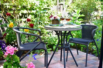 Private backyard with gorgeous landscaped patio oasis for romantic meals during spring and summer warm days