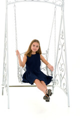 Beautiful Preteen Girl Sitting on Elegant Metal Swing