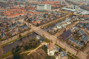 Fototapeta na wymiar Beautiful aerial Amsterdam view from above with water canals and architecture.