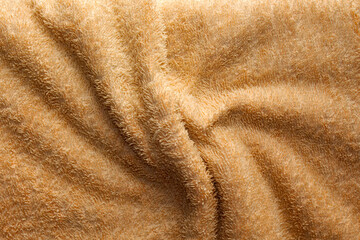 Top view of orange cotton fabric cloth 