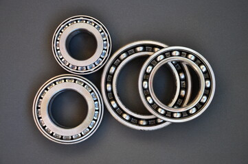 Roller bearings on a black background.
