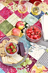Fun summer setting for outdoor gourmet romantic date picnic in beautifully landscaped backyard for stay at home vacation 
