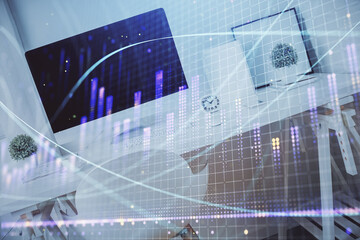 Double exposure of financial graph drawing and office interior background. Concept of stock market.