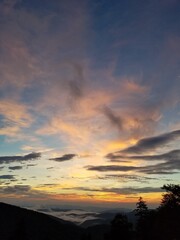 Sunrise over misty mountains