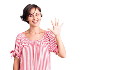 Beautiful young woman with short hair wearing casual summer clothes showing and pointing up with fingers number five while smiling confident and happy.