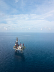 Aerial view from a drone of an offshore jack up rig at the offshore location during day time
