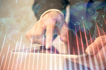 Multi exposure of man's hands holding and using a phone and financial chart drawing. Market analysis concept.