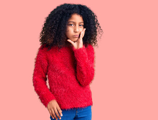 African american child with curly hair wearing casual winter sweater thinking looking tired and bored with depression problems with crossed arms.