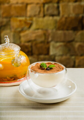 Fresh dessert with cocoa in a transparent bowl.
