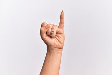 Hand of caucasian young woman showing little finger as pinky promise commitment, number one