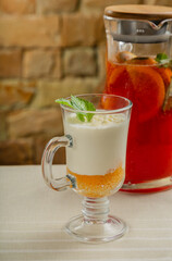 Fresh dessert with white chocolate in a transparent bowl.