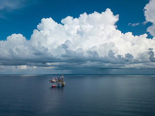 Fototapeta na wymiar Aerial view from a drone of an offshore jack up rig at the offshore location during day time