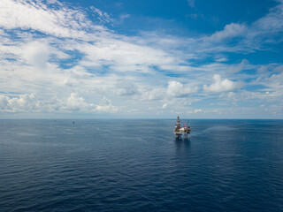 Aerial view from a drone of an offshore jack up rig at the offshore location during day time