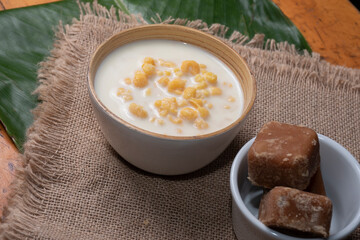 Mazamorra typical Colombian drink accompanied with panela