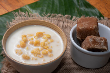 Mazamorra typical Colombian drink accompanied with panela