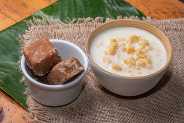 Mazamorra typical Colombian drink accompanied with panela