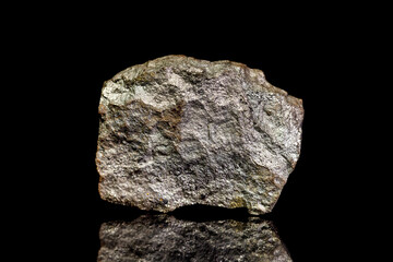 Iron pyrite ore, raw rock on black background, mining and geology