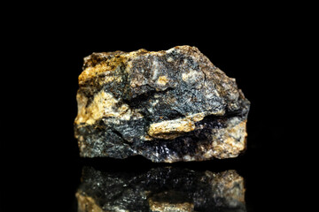 Sphalerite zinc blende ore, raw rock on black background, mining and geology