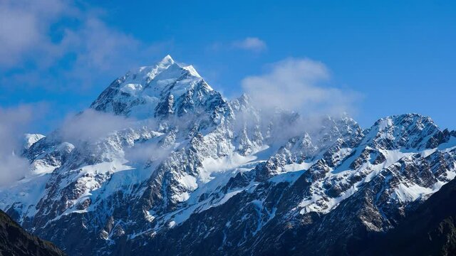 Time-lapse of Mount Cook surrounded by clouds and mist, New Zealand