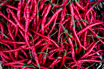 Fresh red hot chili peppers at market