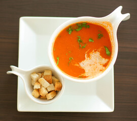 Tomato soup in a white plate